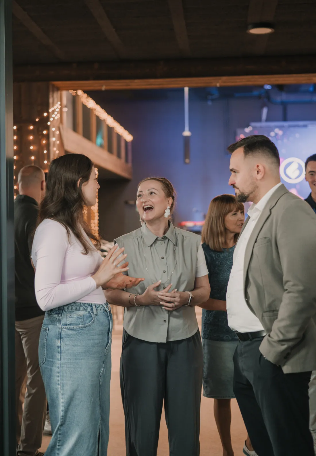 People laughing and talking after a Sunday service at Christian Centre Martin